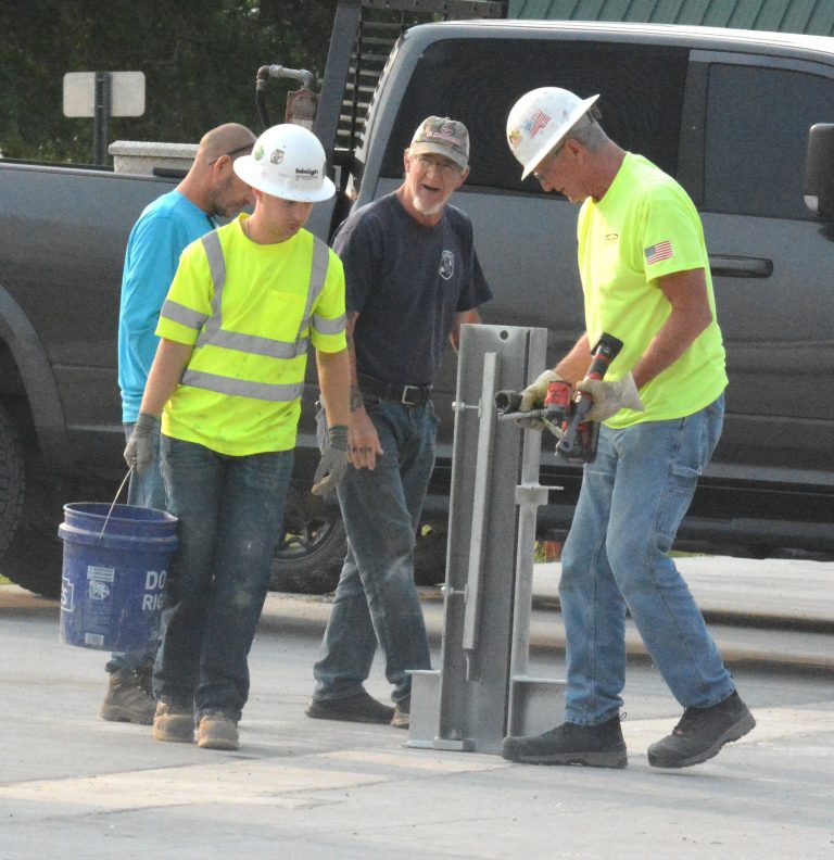 Placing parting post.